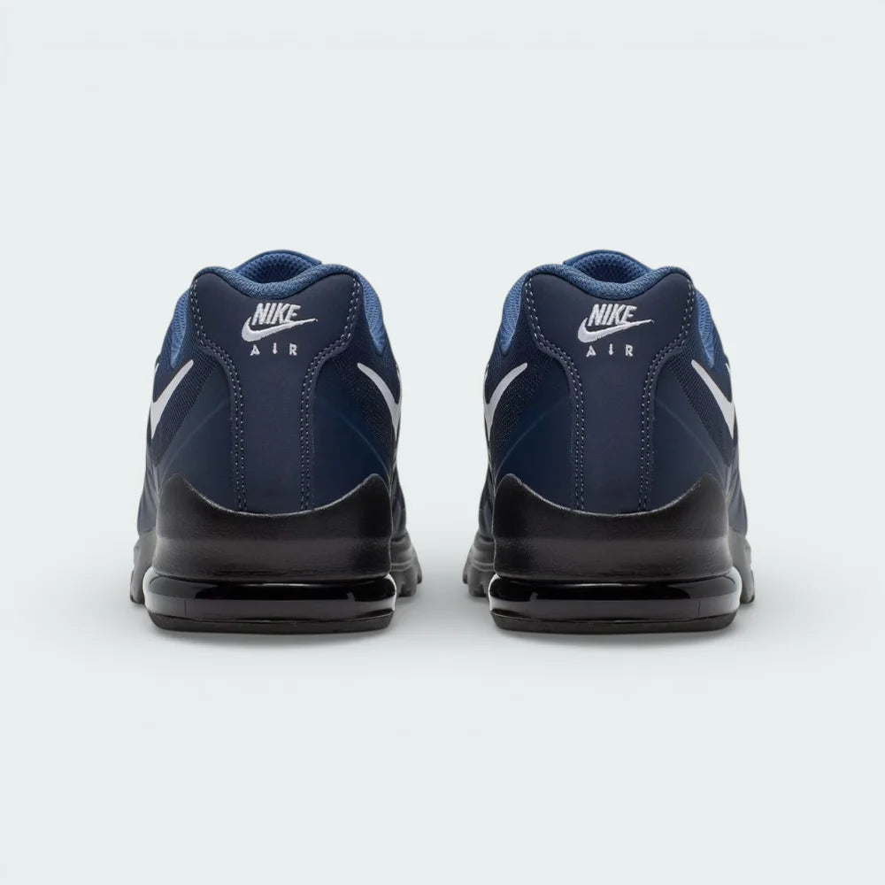 Rear view focusing on the structured heel support and the visible Solar Red Air cushioning windows.