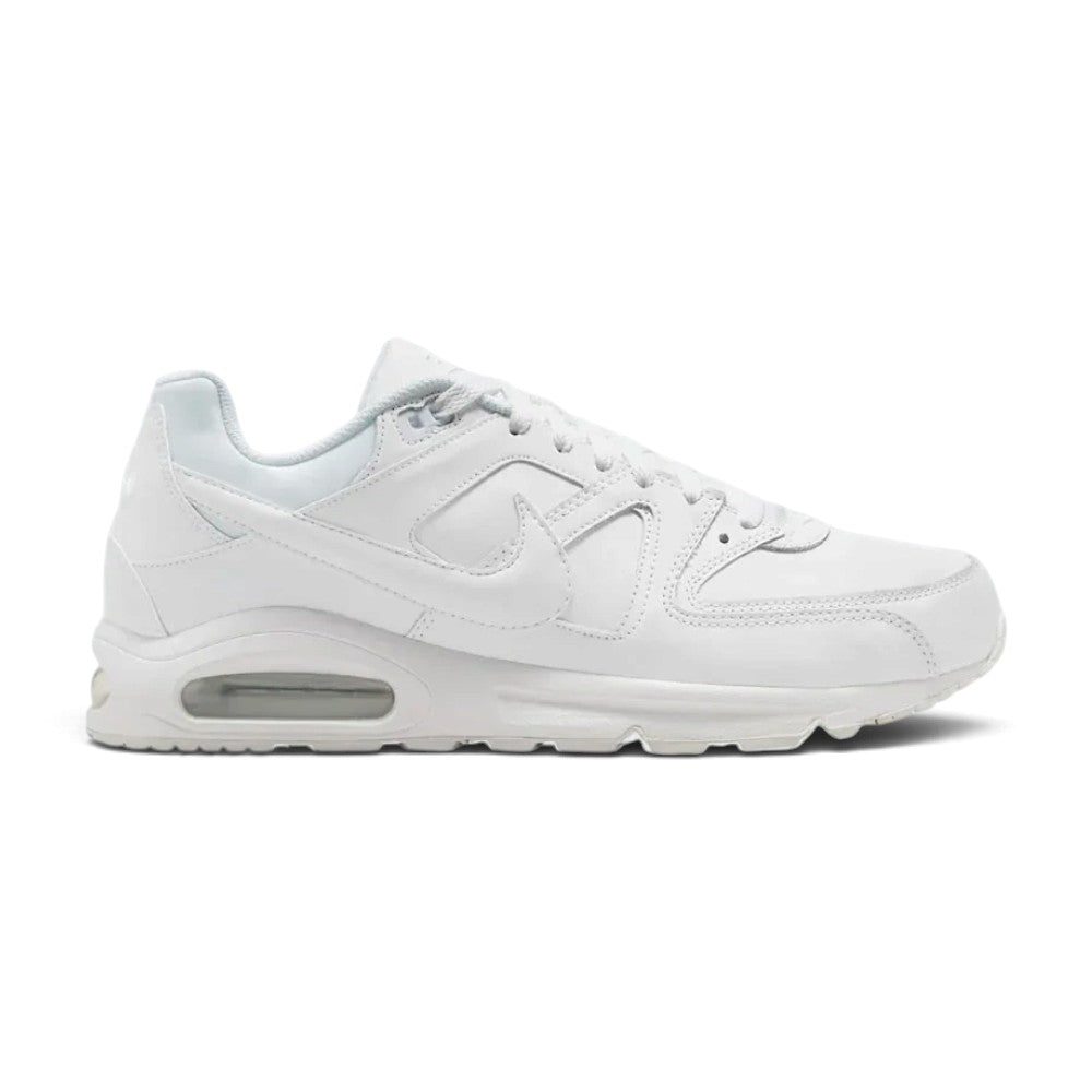 Displays the full lateral silhouette featuring the crisp white leather upper, synthetic overlays, tonal side Swoosh, thick white foam midsole with a prominent visible Max Air heel window, and the matching rubber outsole. Main image