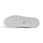 Full-length bottom profile showing the white rubber outsole, highlighting the rectangular waffle-inspired traction blocks, forefoot flex grooves, and recessed Nike branding under the arch.