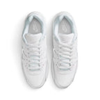 Direct overhead view of both shoes laid flat, showcasing the clean white toe boxes, flat white laces threaded through reinforced eyestays, padded tongues with Nike branding, and cushioned interior footbeds.