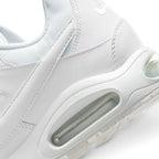 Macro view of the lateral heel transition, highlighting the cellular structure of the visible Max Air window and the durable textured rubber tread wrapping the sole rim.