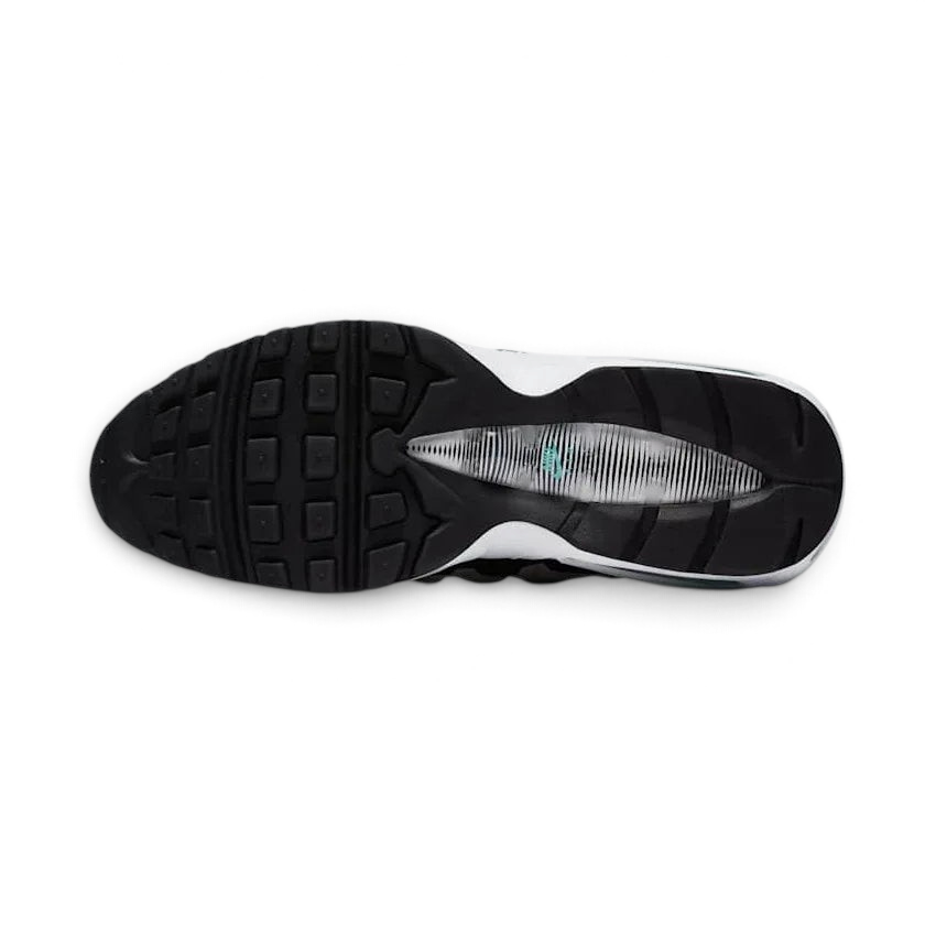 View of the outsole of the Nike Air Max 95 Essential Men's beige running shoes, showing the durable rubber waffle tread pattern.