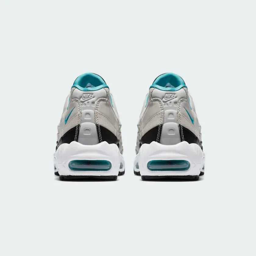 Rear view of the Nike Air Max 95 Essential Men's running shoes, focusing on the prominent heel counter and Nike Air branding.