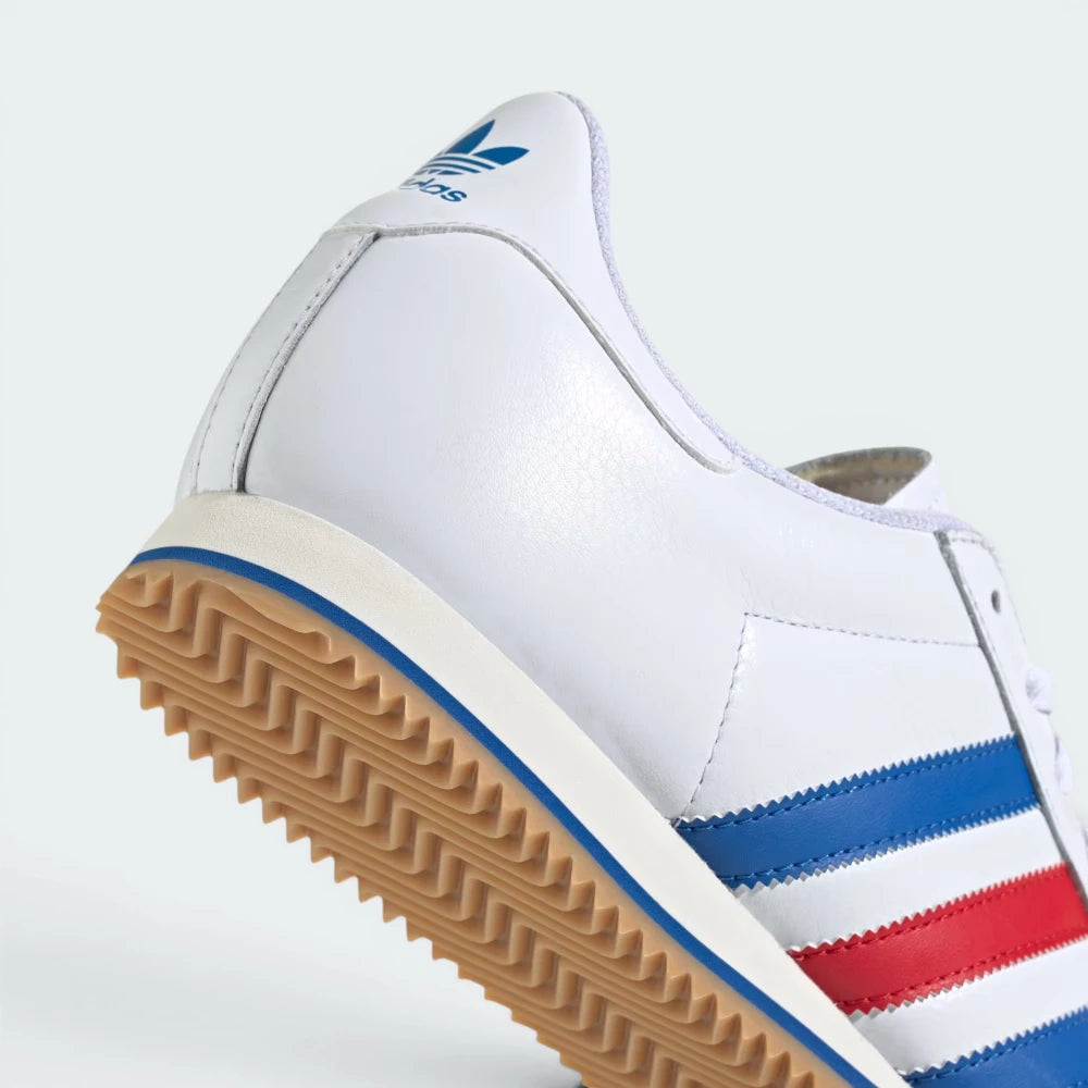 Highlights the "unreal" clean finish where the slim white EVA cushioning layer bonds securely to the vintage gum rubber base.