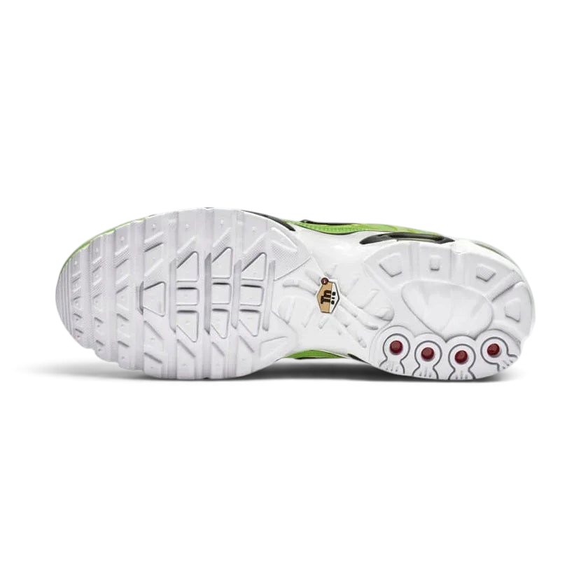 View of the outsole of the Nike Air Max Plus Men's "Lime Blast" trainers, showing the durable rubber tread pattern and flexible design.