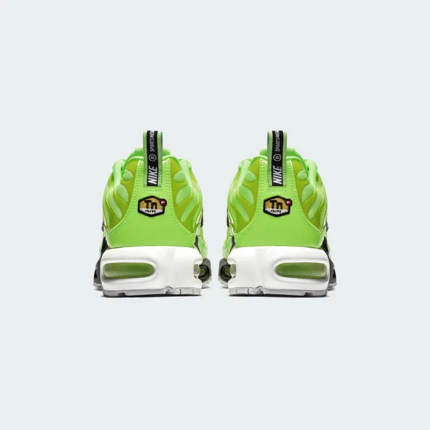 Rear view of the Nike Air Max Plus Men's "Lime Blast" trainers, focusing on the padded heel collar and visible air unit.