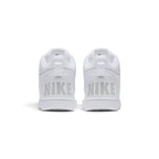 Close-up rear angle focusing on both heel counters, showcasing the bold tonal "NIKE" block lettering, vertical leather overlay, webbed pull loops, and thick padded collar rim.