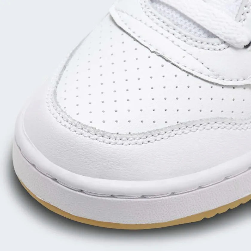Close-up of Nike Court Borough Mid Juniors White Trainers 839977-107 lacing system, smooth upper finish, and mesh tongue