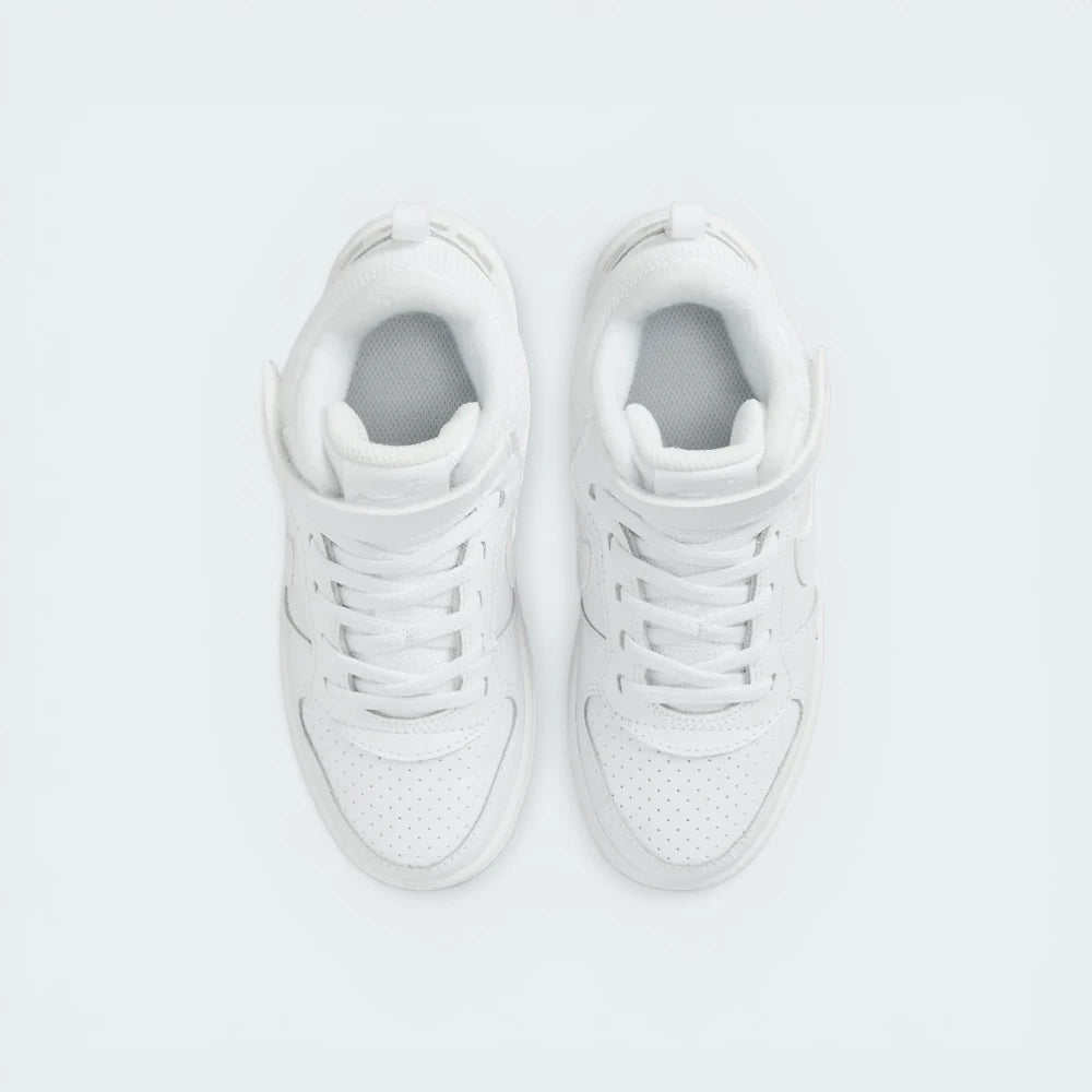 Top-down view of the infant trainers, highlighting the perforated toe box and the secure hook-and-loop strap.