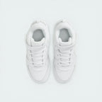 Top-down view of the infant trainers, highlighting the perforated toe box and the secure hook-and-loop strap.
