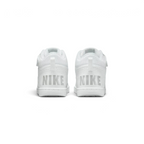 Rear view of the trainers, focusing on the "NIKE" branding on the heel and the padded ankle collar.