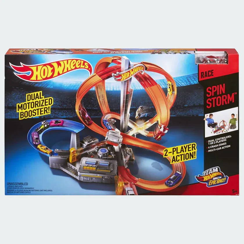 Hot Wheels Spin Storm playset box, showing the track with spinning obstacles, a motorized booster, and a Hot Wheels car racing on it.