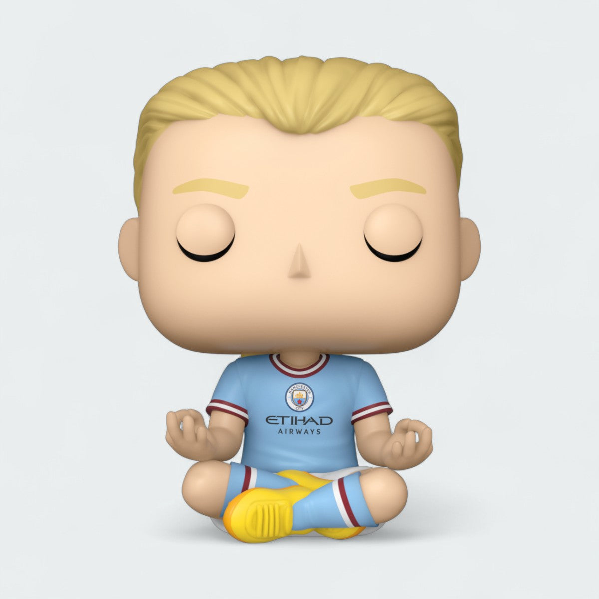 Close-up of the Funko Pop! Erling Haaland #68 vinyl figure's head, showing its stylized design, facial features, and distinct braided hairstyle.