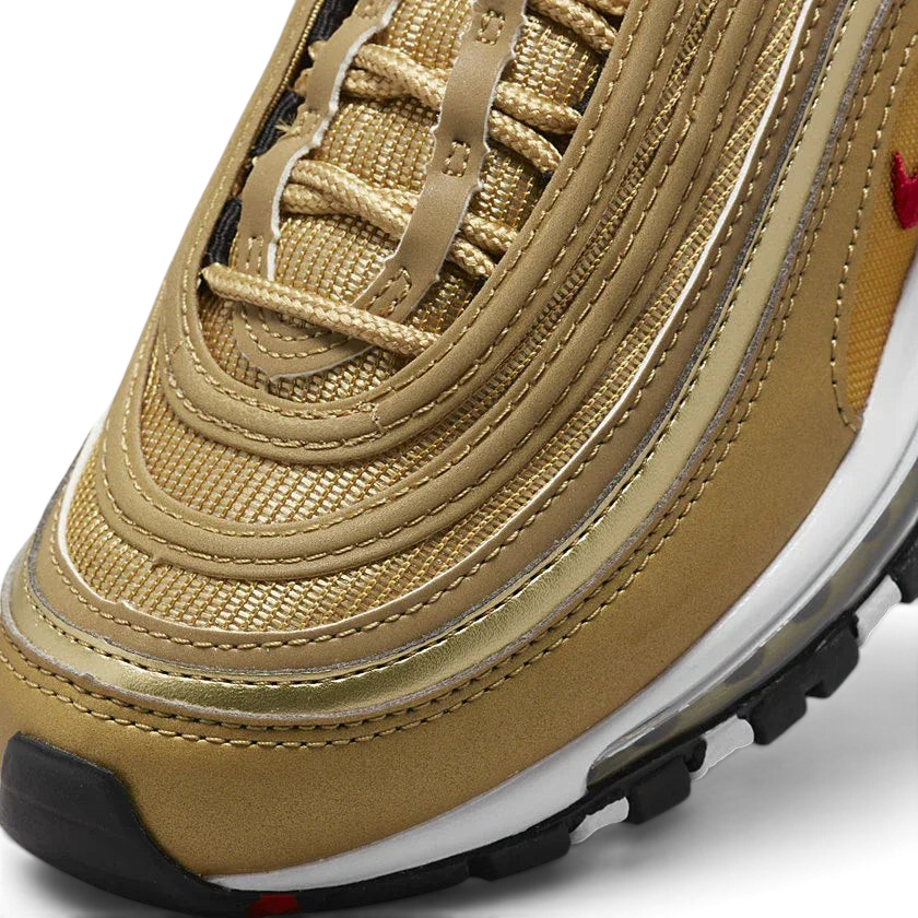 Details the premium stitching wrapping the front toe cap protection matrix and the precision hidden lace eyelet entrances.