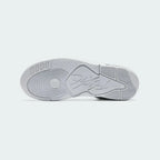 View of the outsole of the Jordan Flight Origin 4 Men's grey basketball shoes, showing the durable rubber tread pattern for multi-directional traction.