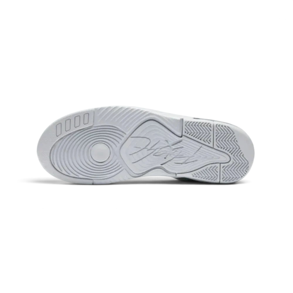 View of the outsole of the Jordan Flight Origin 4 Men's grey basketball shoes, showing the durable rubber tread pattern for multi-directional traction.