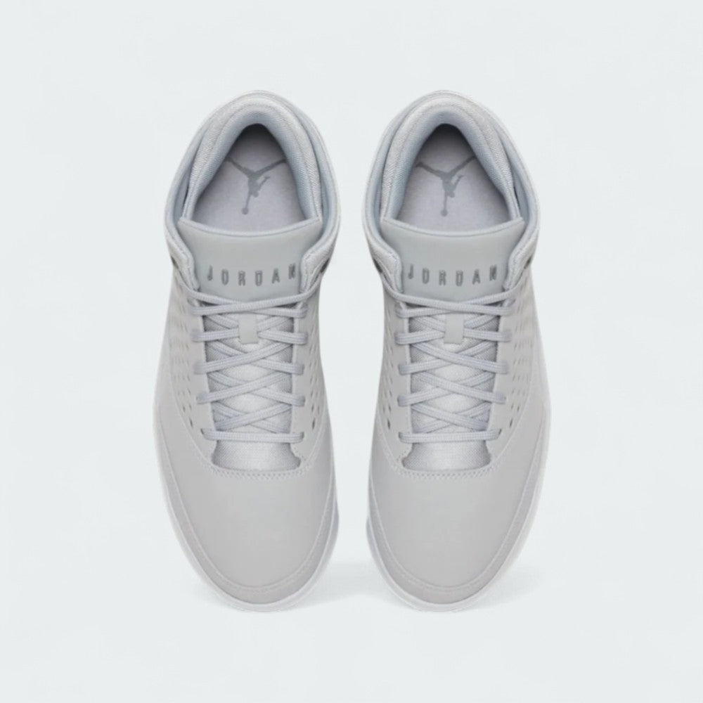 Top-down view of a pair of Jordan Flight Origin 4 Men's basketball shoes in grey, highlighting their structured silhouette and lace-up closure.