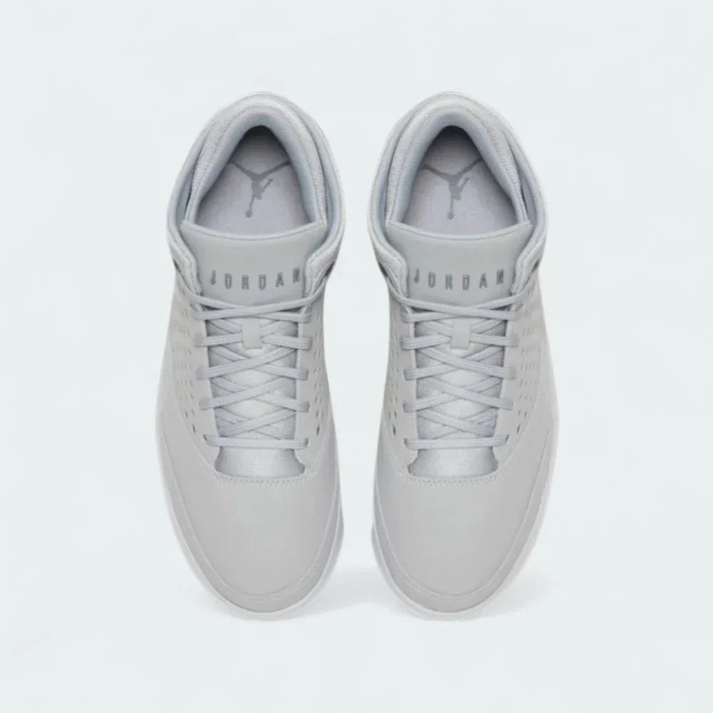Top-down view of a pair of Jordan Flight Origin 4 Men's basketball shoes in grey, highlighting their structured silhouette and lace-up closure.