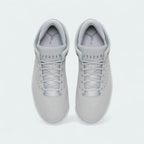 Top-down view of a pair of Jordan Flight Origin 4 Men's basketball shoes in grey, highlighting their structured silhouette and lace-up closure.