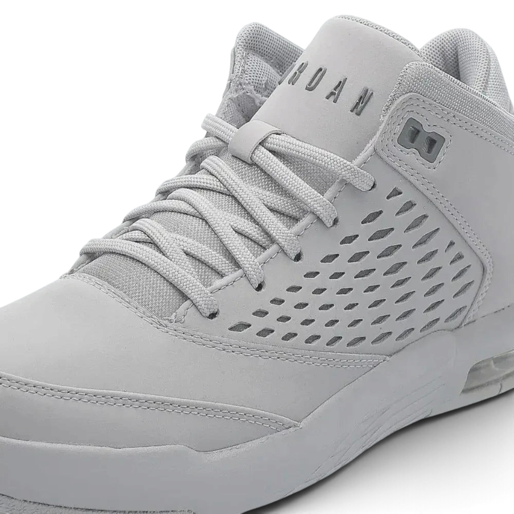 Close-up zoom on the front of the Jordan Flight Origin 4 Men's grey basketball shoes, showing the perforated toe box, lacing system, and textured upper.