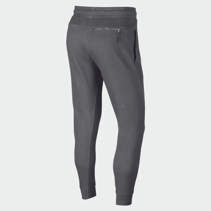 Nike Optic Zip Suit in slate grey featuring the back of the pants