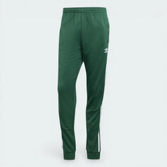 Looking down at the elasticated drawcord waist and the rich green texture of the recycled cotton-blend.