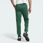 Focusing on the ribbed cuffs and the clean, athletic drape over the back of the legs.