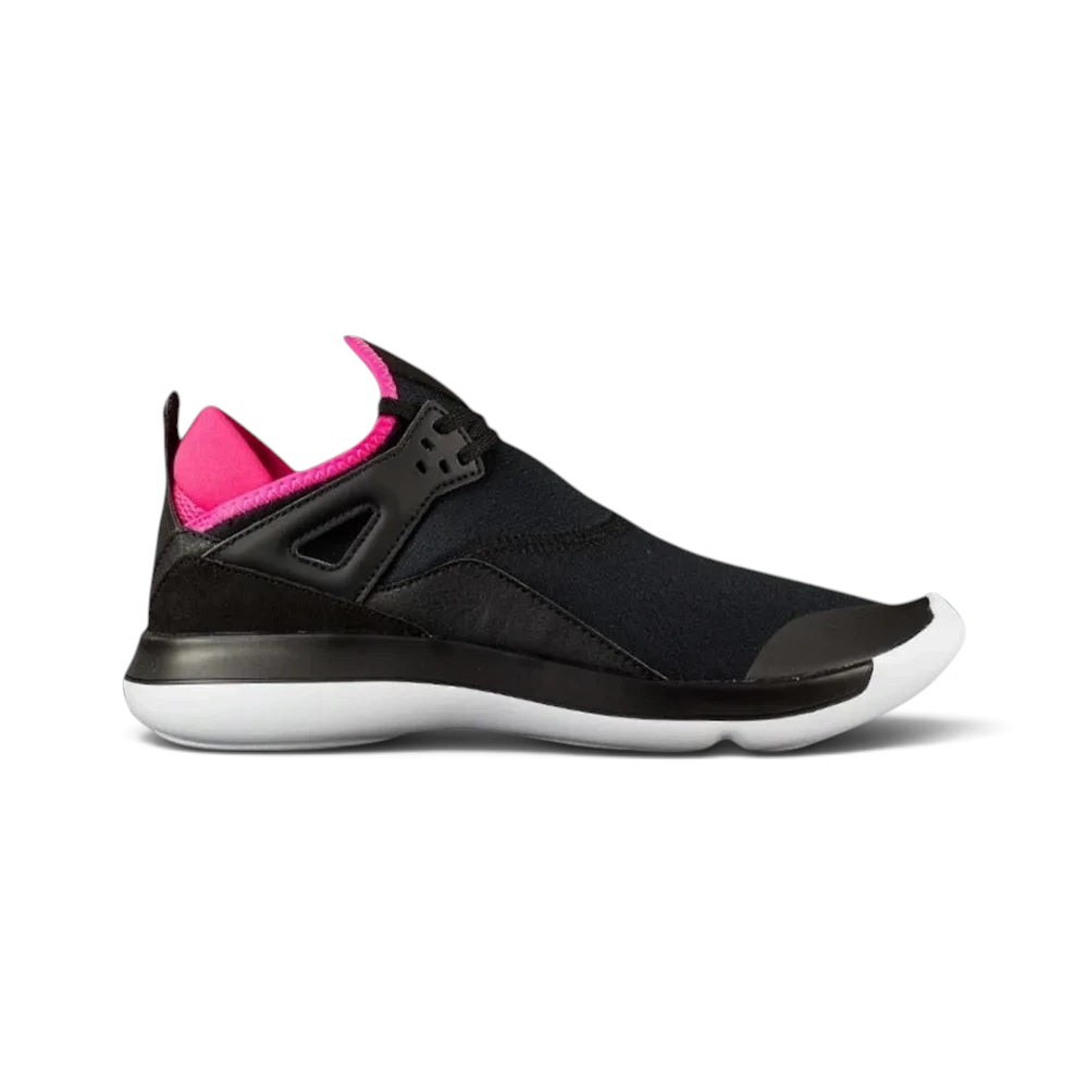 Highlights the high-velocity lines of the black neoprene bootie upper, showing the professional integration of the iconic Jordan 4 side wings and the clean white foam midsole cutting across the hyper pink accents. Main image