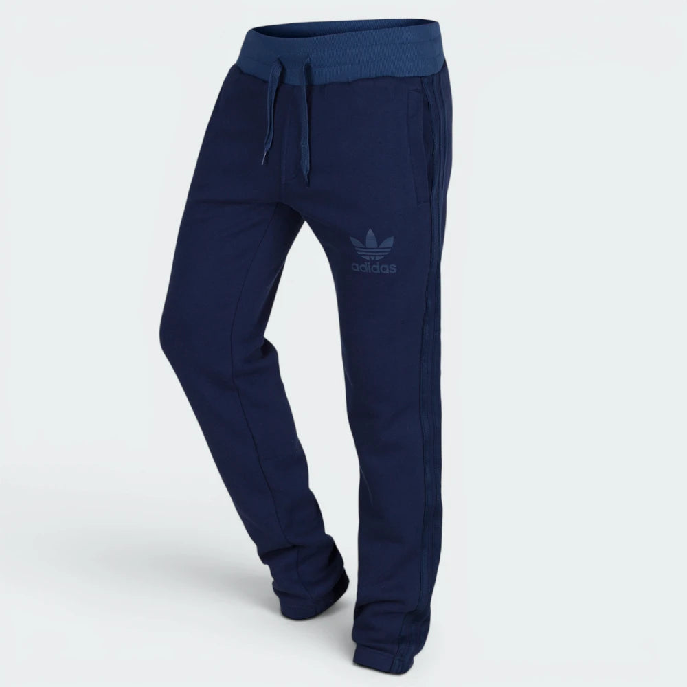 Emphasising the locked-in ankle cuffs and the professional "Collegiate Navy" colour depth.