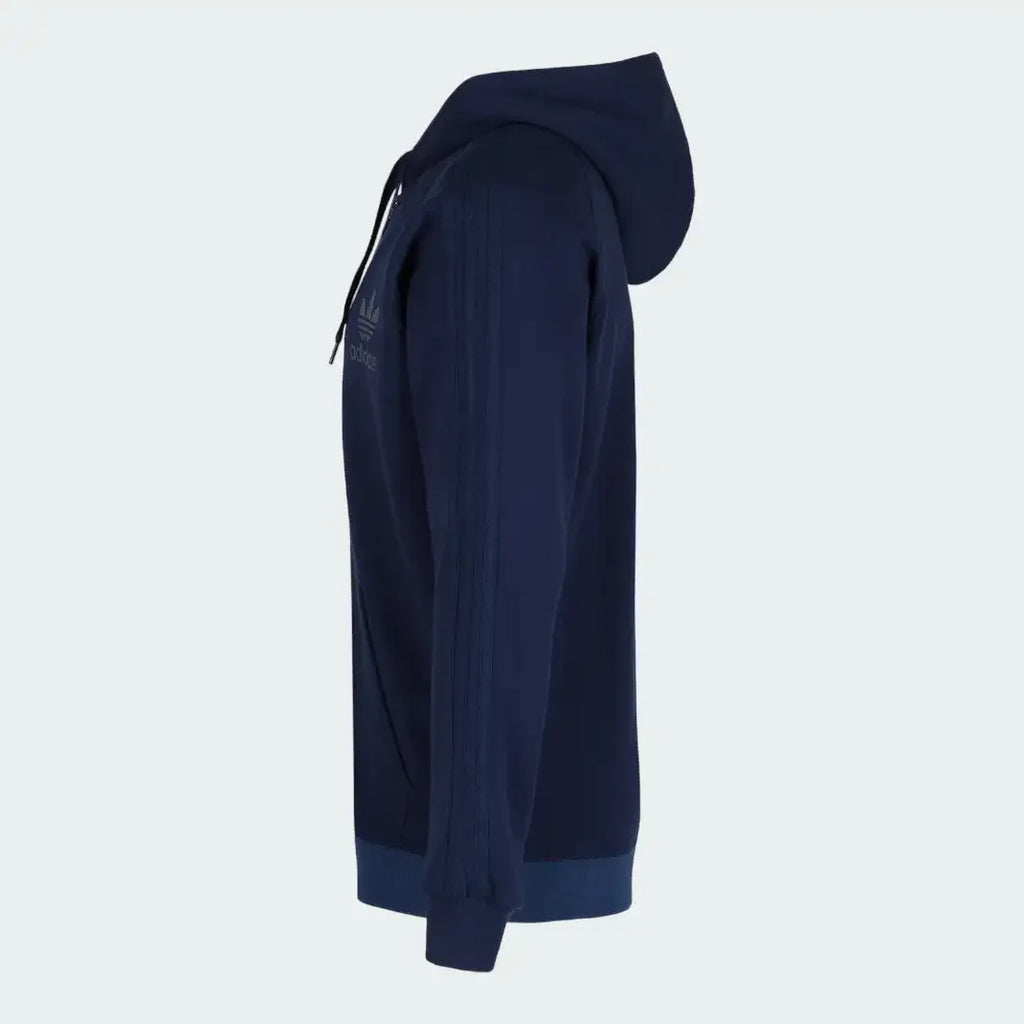 Adidas Men's Trefoil Fleece Hooded Track Jacket in collegiate navy, side profile showing the slim fit, cuffed arm, and zippered side pocket.
