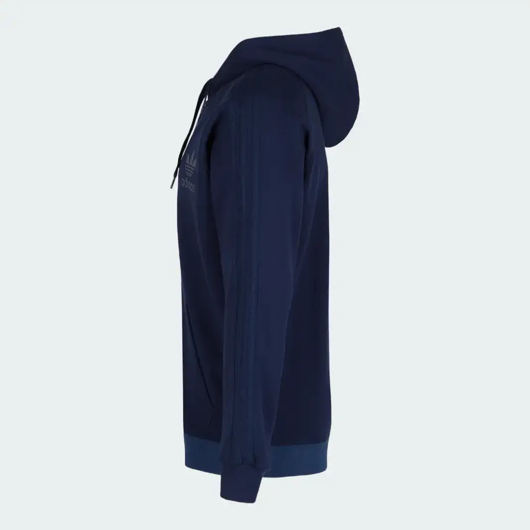 Adidas Men's Trefoil Fleece Hooded Track Jacket in collegiate navy, side profile showing the slim fit, cuffed arm, and zippered side pocket.