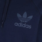 Close-up zoom on the Adidas Men's Trefoil Fleece Hooded Track Jacket, showing the soft fleece lining and the screen print Trefoil logo detail.