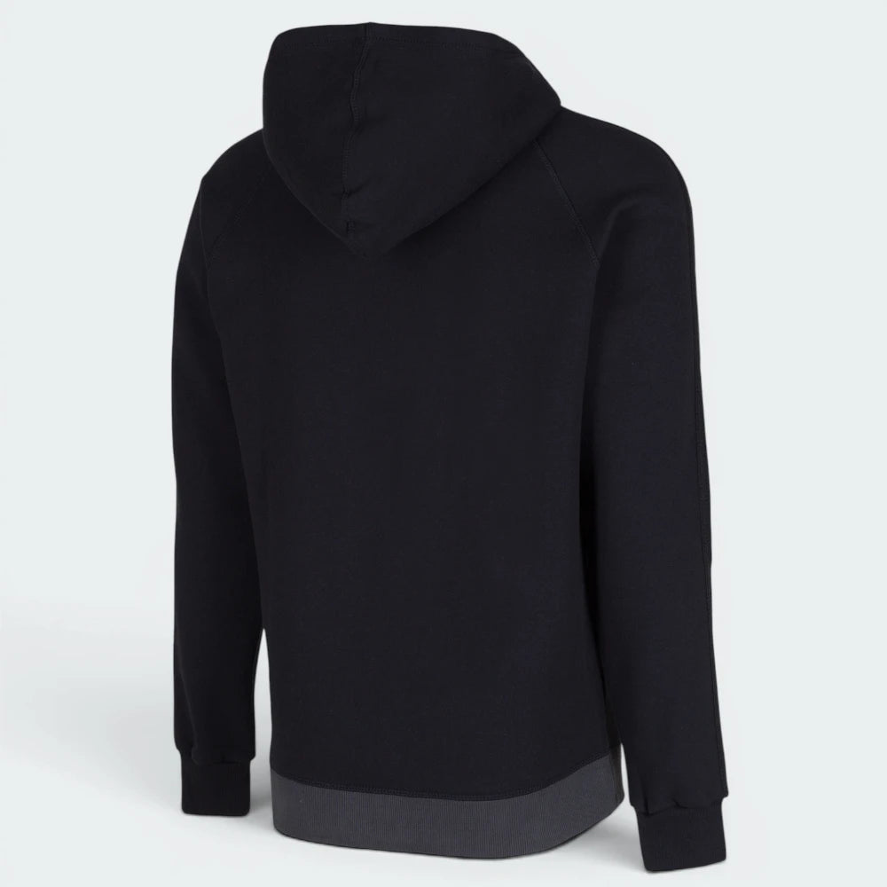Focusing on the clean back silhouette and the professional finish of the ribbed hemline.