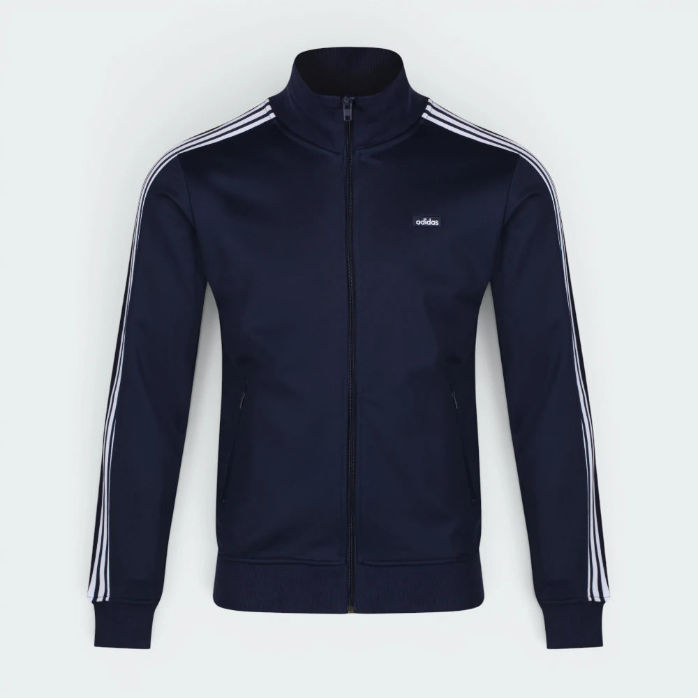 Highlights the high-velocity sweep of the continuous crisp White 3-Stripes tracking cleanly down the Navy blue arm, showing the professional, texturized weave of the heavyweight piqué fabric blend.