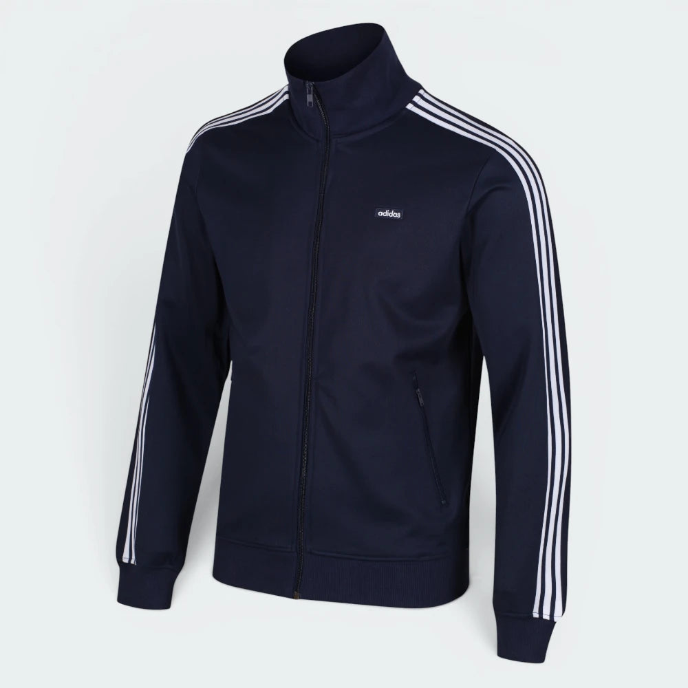 Focuses on the symmetry of the flat-laid track jacket, displaying the perfect alignment of the high stand-up collar, the white zip track, and the balance of the embroidered Trefoil logo.