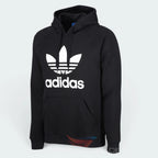 Emphasising the locked-in ribbed hem and the professional "Black" colour depth.