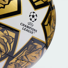 Zoom looking at the front of the ball and the printed UCL logo, highlighting the texture of the recycled TPU cover.