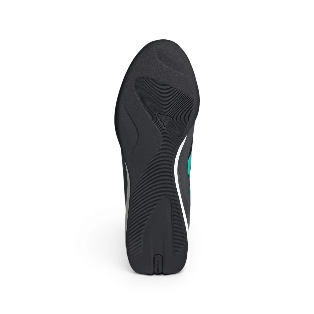 Bottom-down view of the black rubber outsole, showcasing the circular pivot zones, grooved traction lines, and embossed adidas branding.