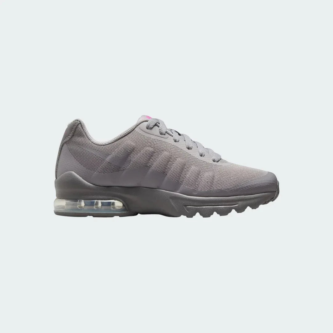 Nike Air Max Invigor Print Girls' trainers in black with a multi-colored print, side profile showing mesh upper, prominent visible Max Air unit in the heel, and sleek silhouette. Main image