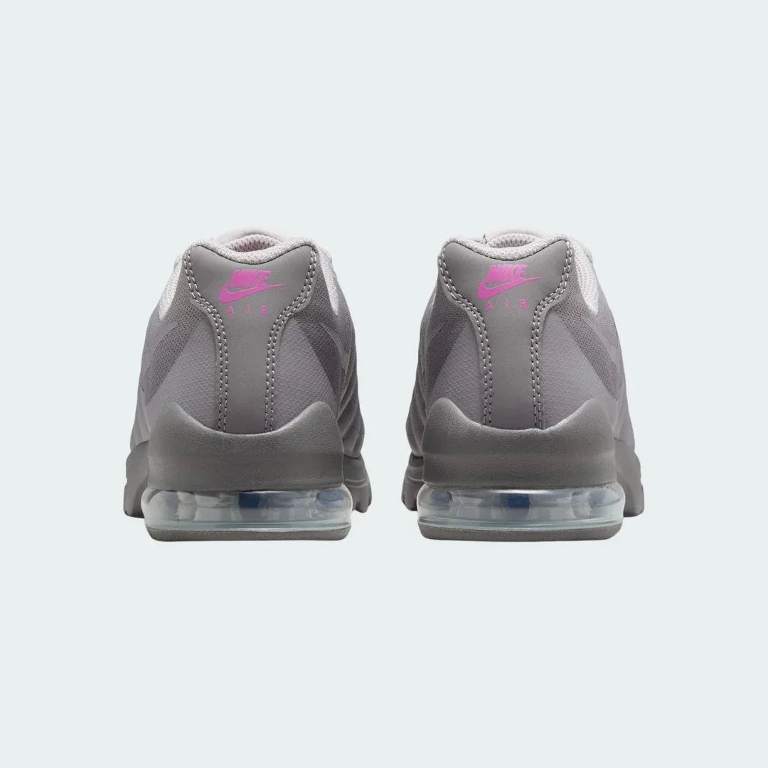 Rear view of the Nike Air Max Invigor Print Girls' black trainers, focusing on the visible Max Air unit in the heel and subtle branding.