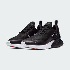 Angled view of two Nike Air Max 270 Men's black trainers, side by side, showcasing their bold design and visible Air unit.