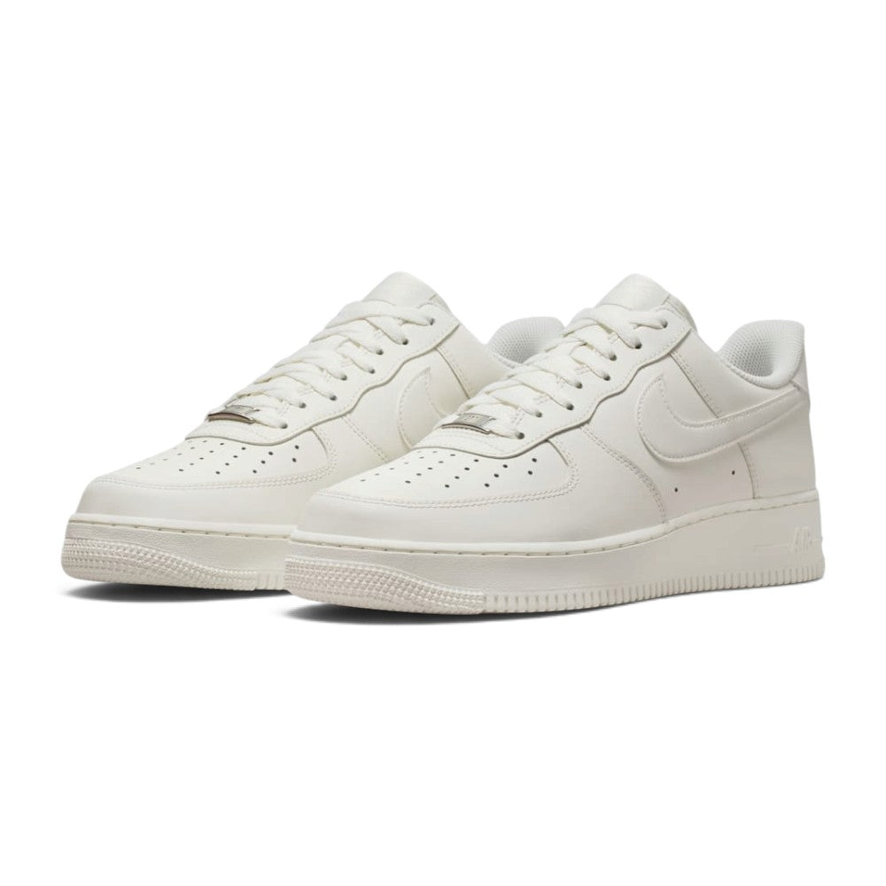 Forward three-quarter angle showcasing both shoes side by side, highlighting the streamlined running stance, premium seasonal colorway, layered side branding, and clean white midsole geometry.