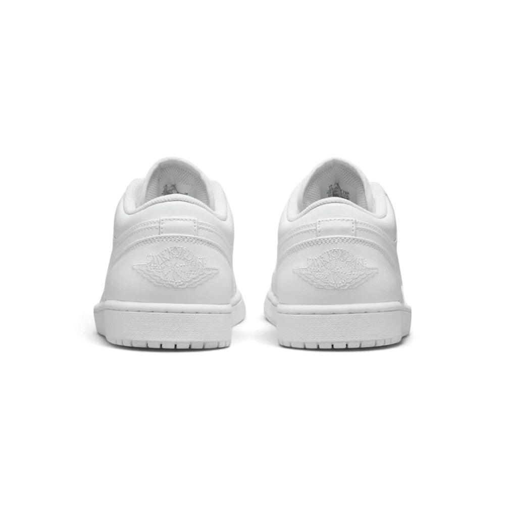Rear view of the sneakers emphasizing the heel overlays, embroidered Wings logo, and the textured rubber sole wrap.