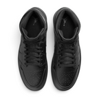 Focuses on the locked-in traditional lacing layout, displaying the perfect symmetry of the matte black cotton laces, the tonal textile tongue, and the iconic starburst perforation pattern tracking down the front leather toe box area.