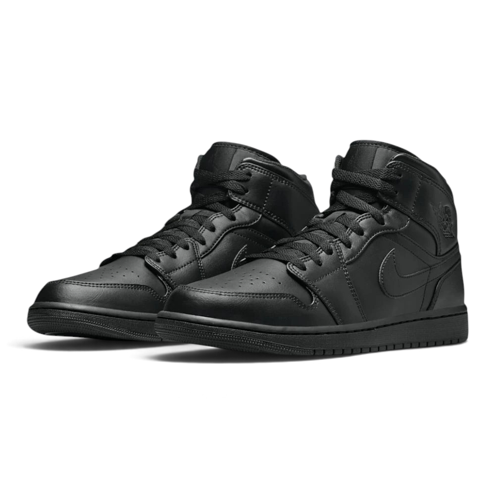 Emphasising the legendary, high-top court stance of the trainers and the professional, stealthy harmony of the blacked-out multi-paneled leather framework.