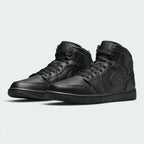 Emphasising the legendary, high-top court stance of the trainers and the professional, stealthy harmony of the blacked-out multi-paneled leather framework.