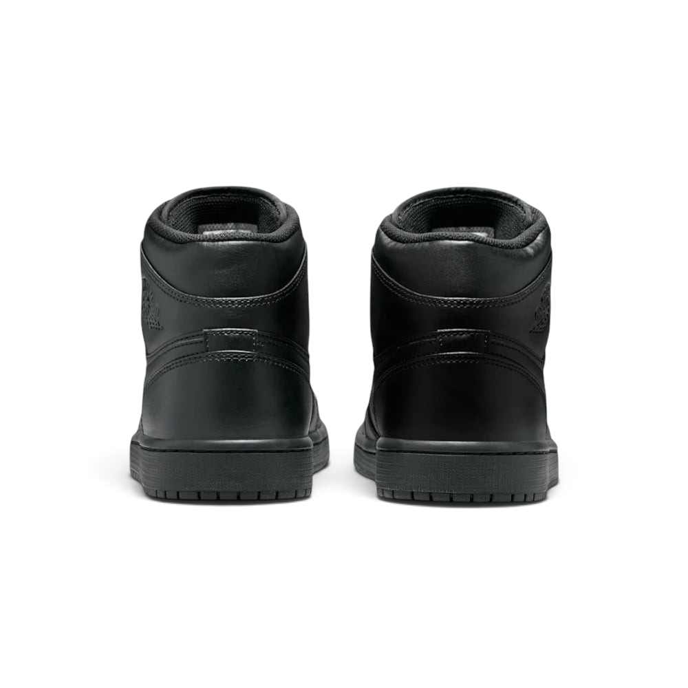 Focuses on the contoured shape of the padded ankle collar, highlighting the seamless leather heel cup and the clean, uniform stitching rows tracking cleanly above the dark rubber sole line.