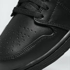 Details the premium precision of the double-stitched leather panels framing the toe cap overlay protection matrix, displaying how beautifully the laces track over the soft textile tongue.
