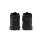 Rear view of the sneakers emphasizing the heel counter panels, ankle collar cushioning, and clean wrapped sole construction.