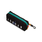 Close-up of the standalone black zippered pencil case, showcasing the printed white "JORDAN" block text, integrated purple Jumpman logo, teal zip seam, red pull tab, and black carabiner attachment clip.
